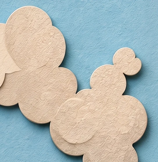 A cluster of round cream clouds floating in a pale blue sky