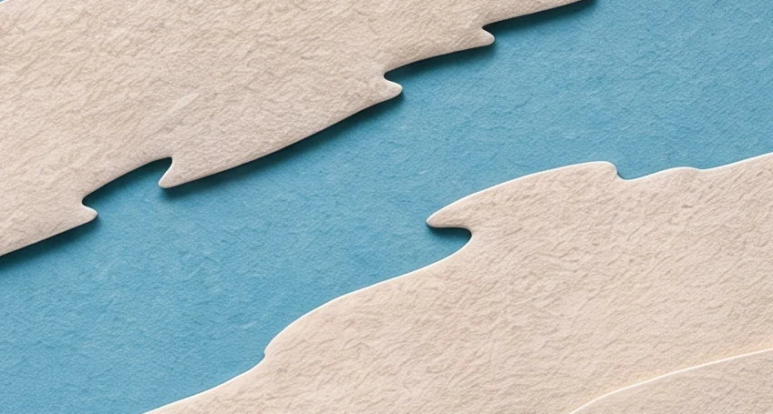 A bright blue sky crossed by ragged cream clouds, with the tip of a red cape at the edge