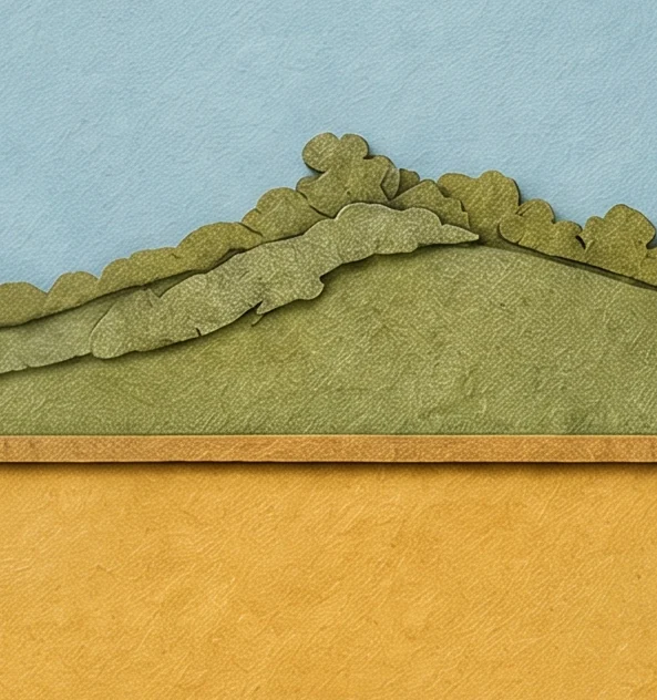 Low green hills under a pale blue sky above a strip of yellow ground